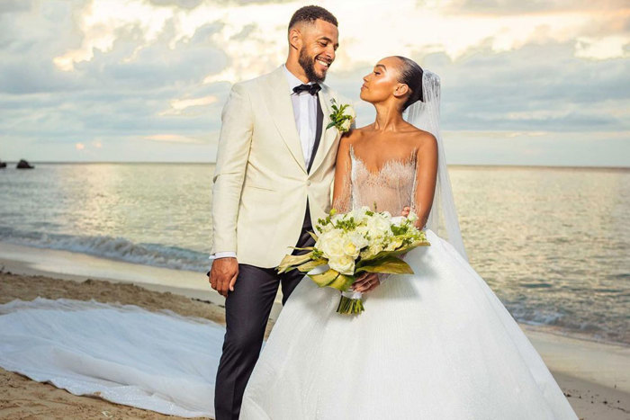 Leigh Anne Pinnock and Andre Gray on a beach