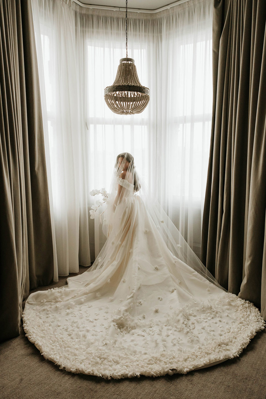 flower applique wedding train at window