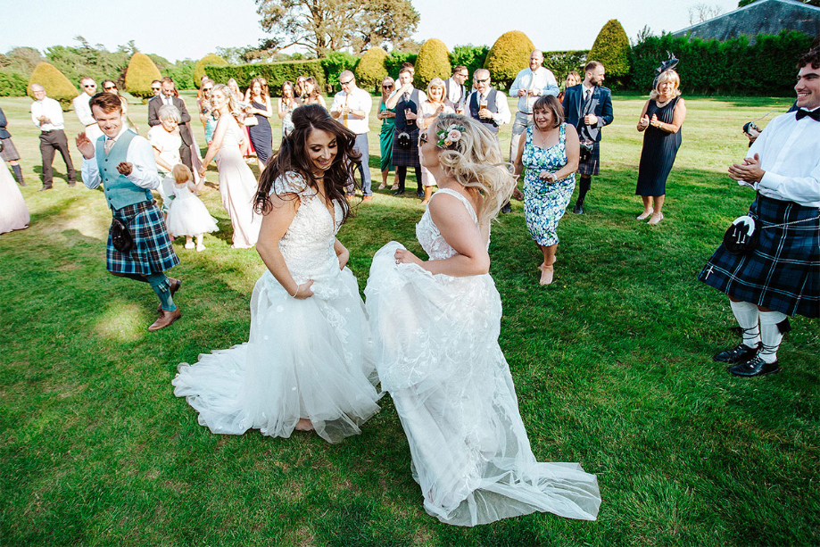 Brides dancing outside