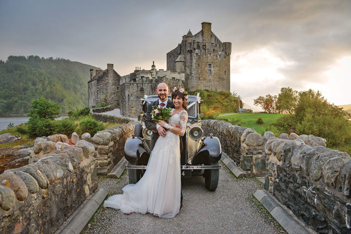 Bride And Groom Outside Eilean Donan