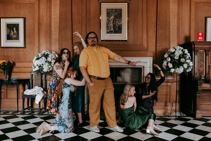 Wedding guests pose for photo