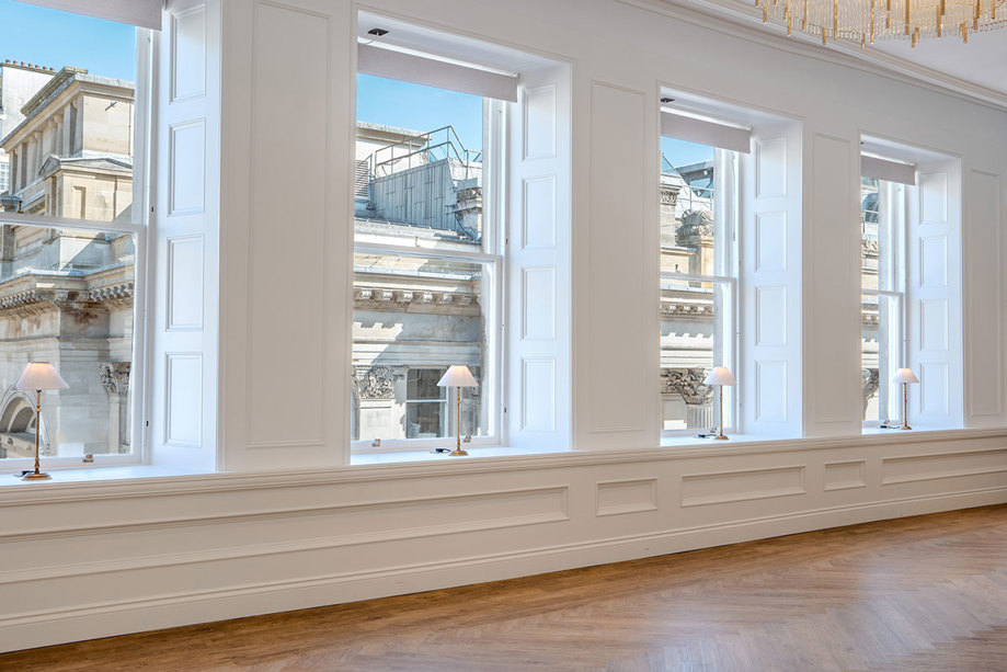 views of the city centre from large windows at the exchange in glasgow