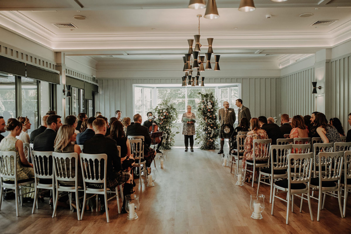 Guests at the wedding ceremony in Hazlehead Park 