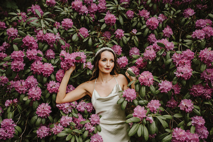 Bride amongst purple flowers