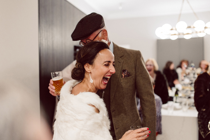 Bride Hugging Guest