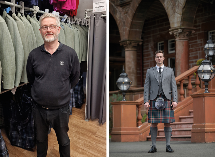 Man on left wearing all black with arms behind back, man on right with highlandwear look standing in front of staircase with lights