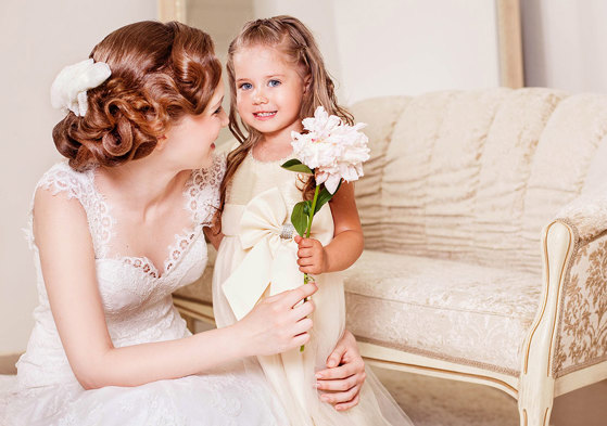 Bride At Wedding With Flower Girl