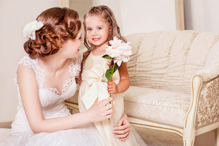 Bride At Wedding With Flower Girl