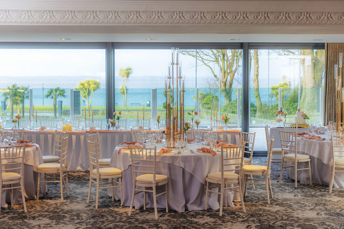 Brisbane suite at Brisbane House set for wedding dinner with view to Firth of Clyde