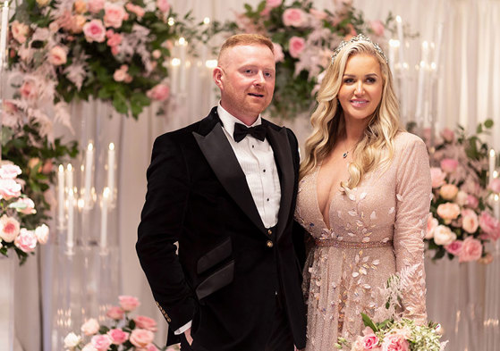 bride and groom posing at Torrance Hotel wedding 