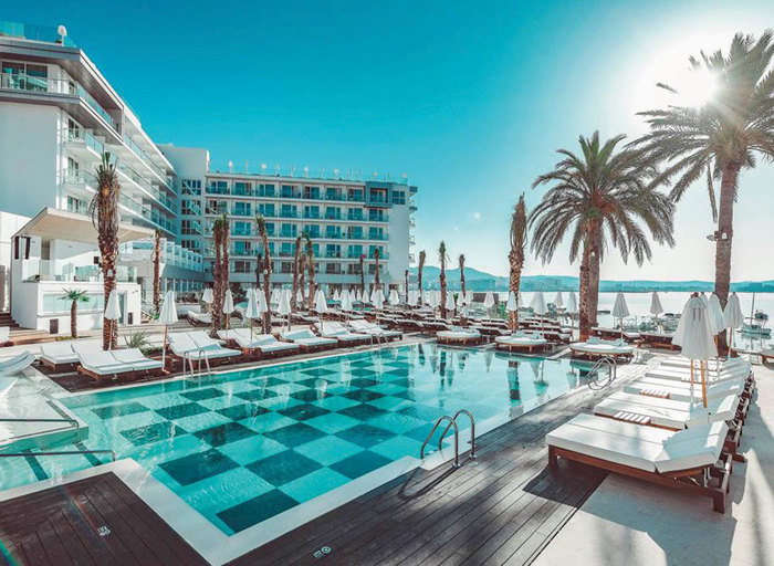 The pool and loungers at Ocean Beach Club in Ibiza