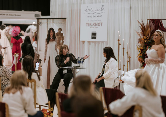 people watching the Let's Talk Tying the Knot stage at the Scottish Wedding Show