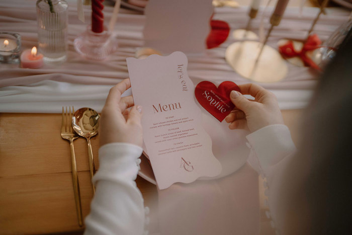 a pink and red theme wedding menu