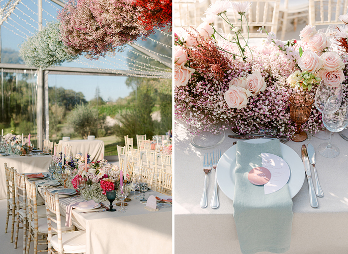 a wedding dinner table and table place setting with flowers at Quinta De Sao Tadeu