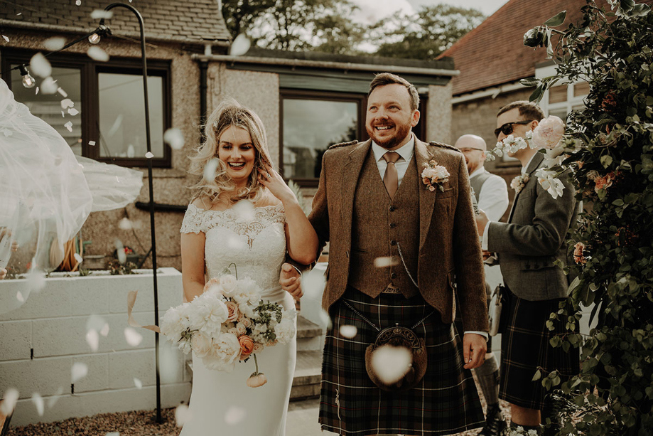 Bride's veil blows away during wedding day