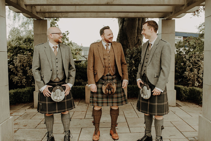 Groom and groomsmen in their kilts