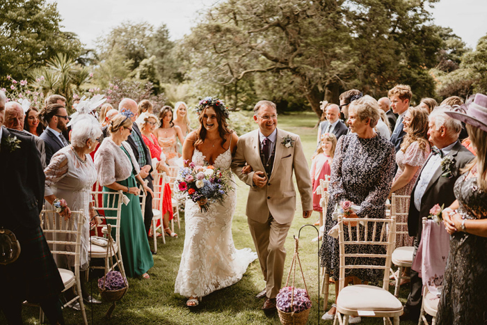 Bride walks down the aisle with her father