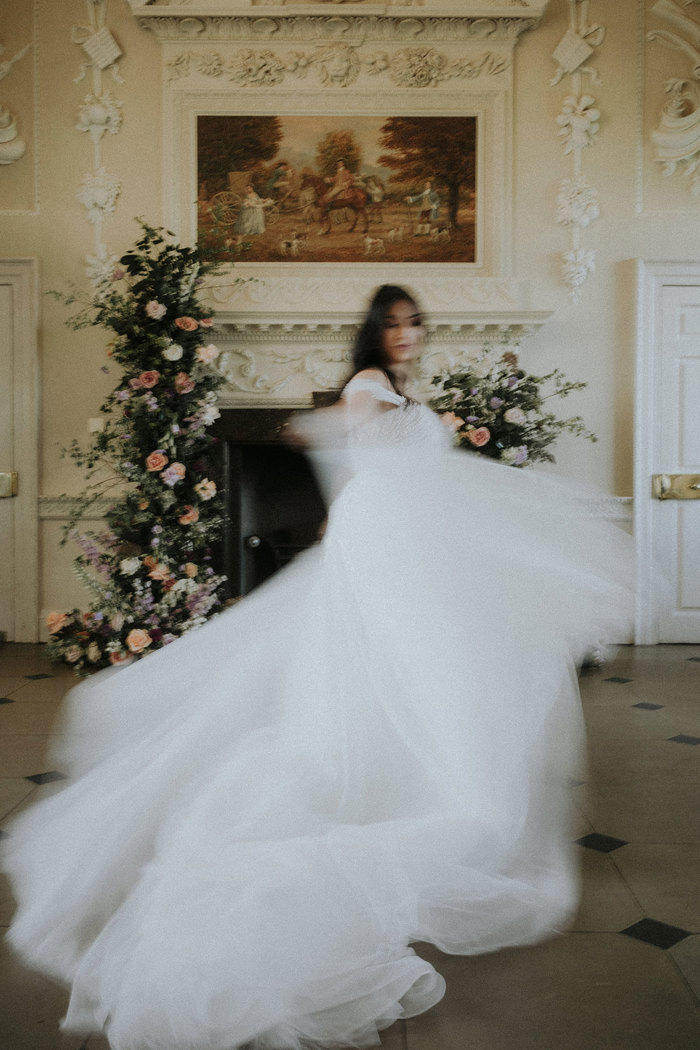 bride spinning around in wedding dress Chatelherault shoot