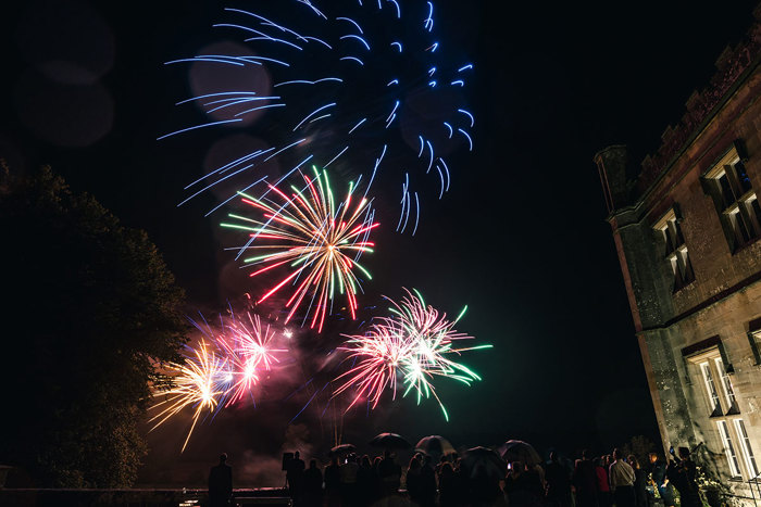 a firework display lights up the night sky outside Blairquhan Castle