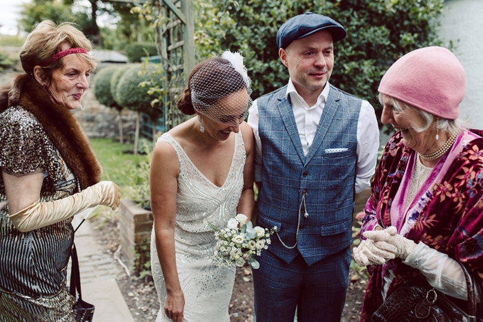 Bride, groom and guests during the ceremony