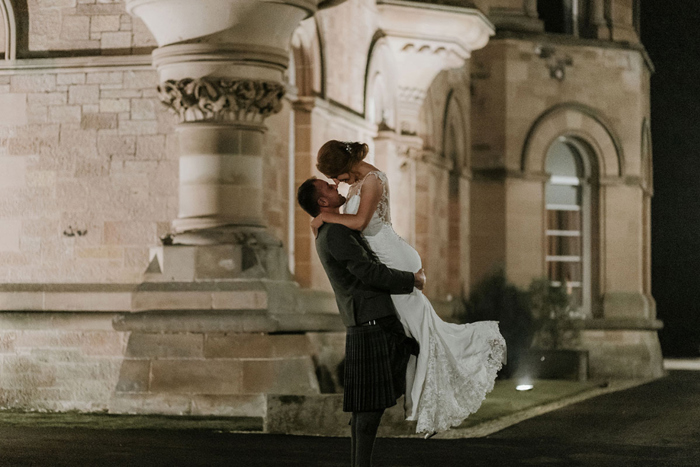 A Groom Lifting A Bride Up At Cornhill Castle