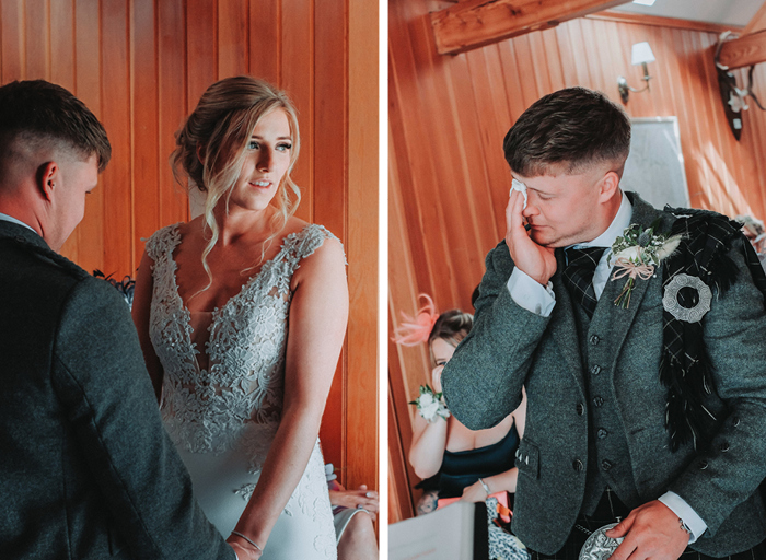 a bride wearing a lace bodice wedding dress holding hands with groom on left. a groom wipes tears away with a handkerchief on right