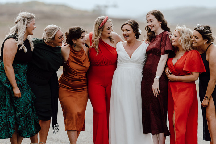 Bride smiles with female guests