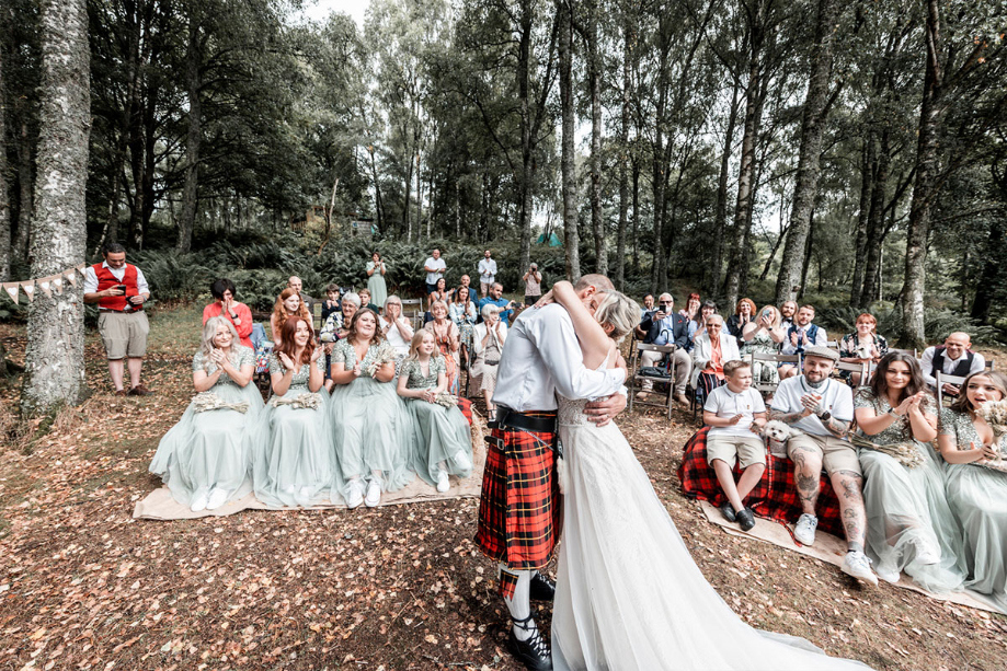 Couple hug during their ceremony