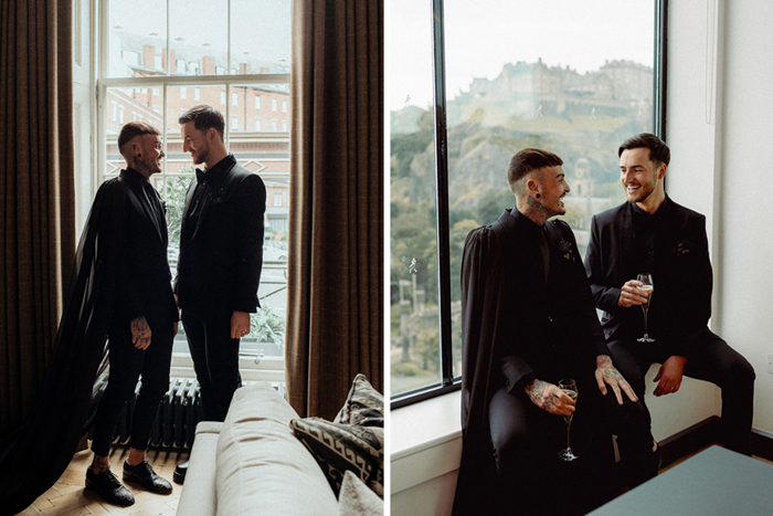 Two Men Wearing Black Posing By A Window