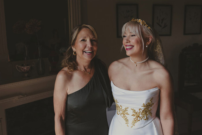 A person and bride in a wedding dress