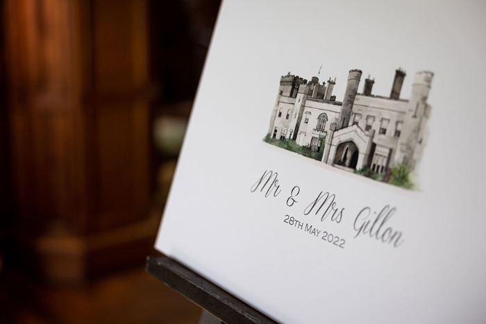 Wedding sign showing venue, couple's name and wedding date