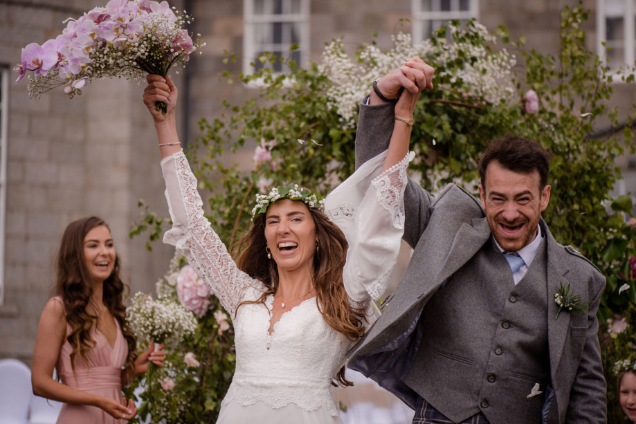 Cheering Bride And Groom