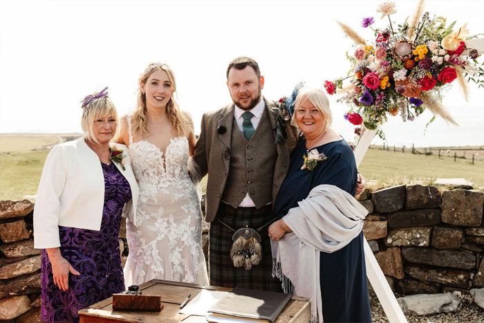 Bride and groom with their mothers