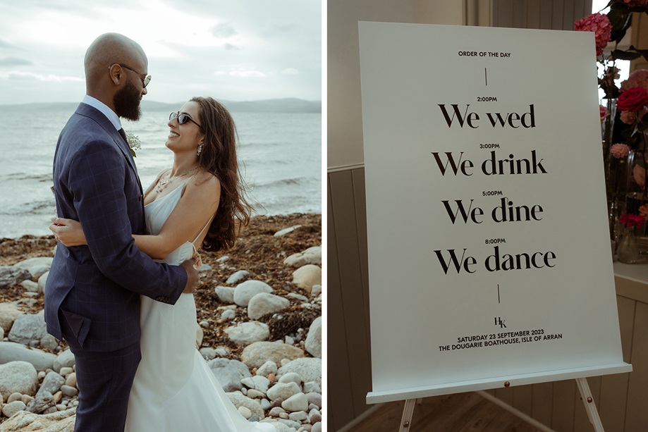 A Bride And Groom Embracing On A Stone Beach On Arran And A Wedding Sign Reading 'We Wed We Drink We Dine We Dance'