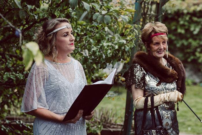 Guests during outdoor wedding ceremony