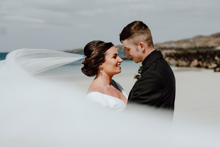 Bride and groom couple portrait on Lewis beach