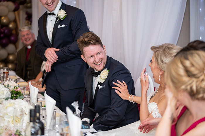 A Bride And Groom Laughing At The Weigh Inn In Thurso