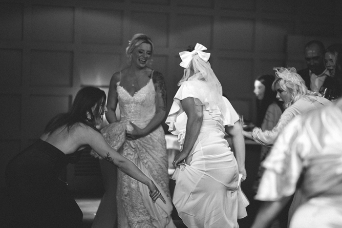 Black and white image showing brides on the dance floor