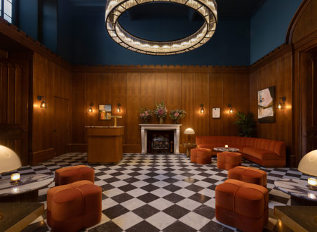 the new reception area that welcomes guests at mar hall including a checkerboard floor