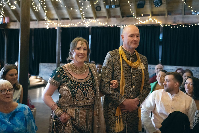 A person and person in traditional indian attire.