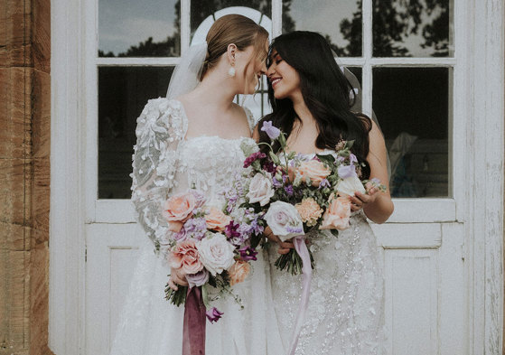 brides looking at one another at Chatelherault shoot