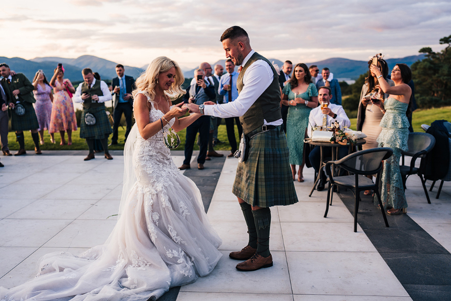 Bride and Groom Dancing Outside