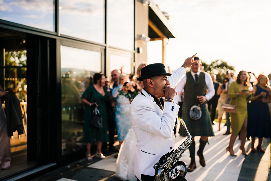 Saxingh plays to guests on the Outdoor Dancefloor