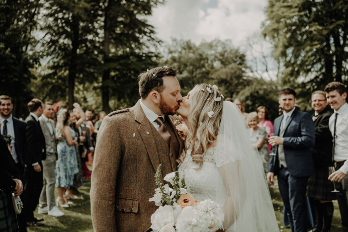 Bride and groom kiss after the ceremony