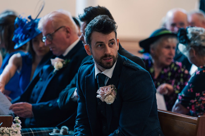 Groom during ceremony