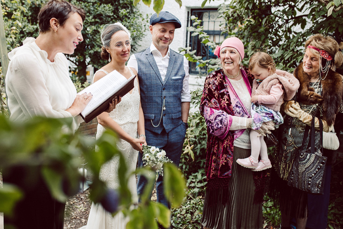 Bride, groom and guests during the ceremony