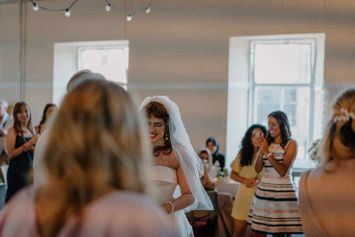 Bride dancing during reception in Garnethill Multicultural Centre 