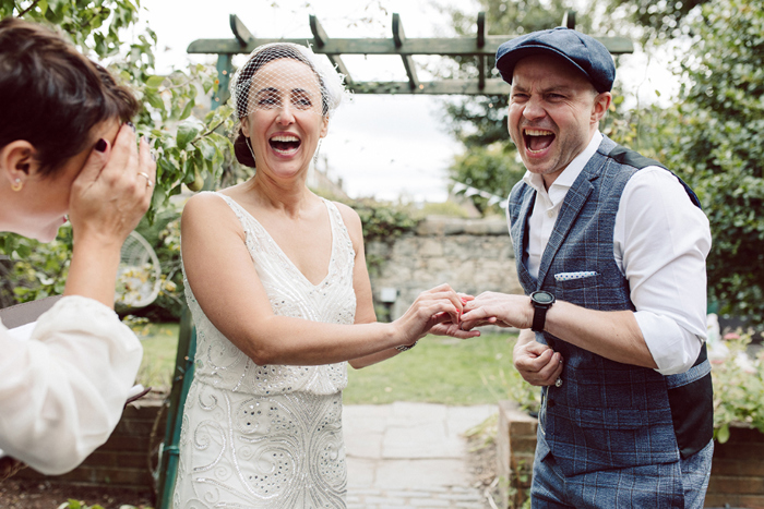 Couple Exchanging Rings during outdoor ceremony