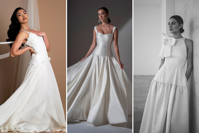 Three models wearing wedding dresses with dropped waistlines