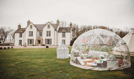 Igloo in front of exterior of Stemster House